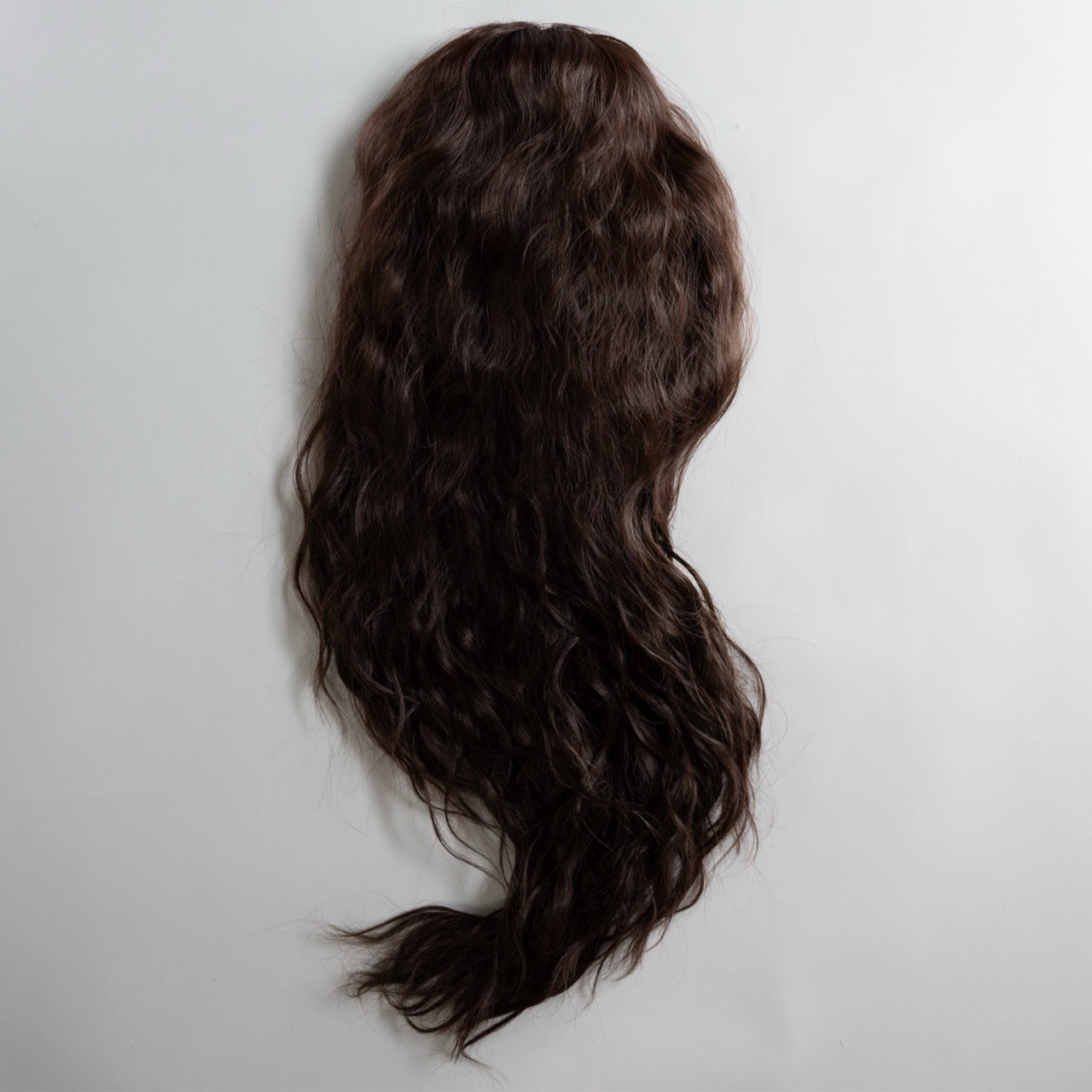 Ponytail Extension in Dunkelbraun, wellig, 70 cm - Frontansicht