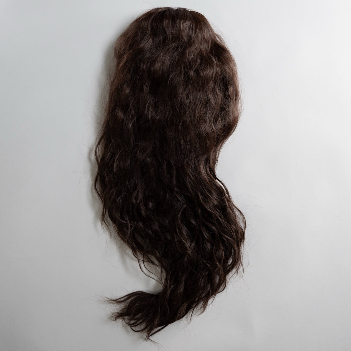 Ponytail Extension in Dunkelbraun, wellig, 70 cm - Frontansicht