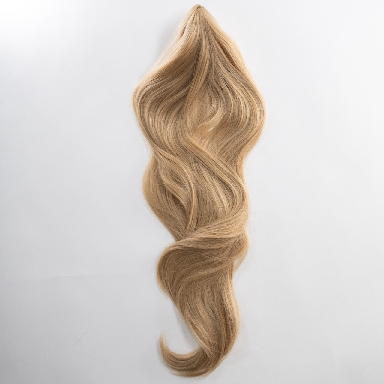 Ponytail Extension in Hellblond Asch, leicht wellig, 75 cm - Frontansicht