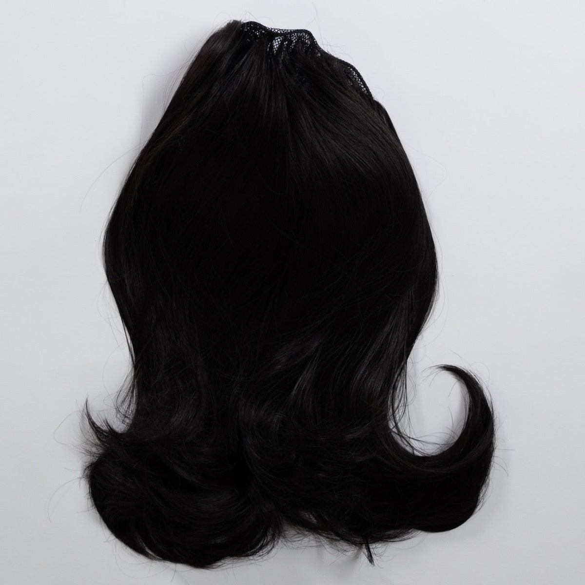 Ponytail Extension in Schwarz, leicht wellig, 55 cm - Frontansicht